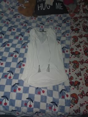 White Tassel-Accent Sleeveless Blouse